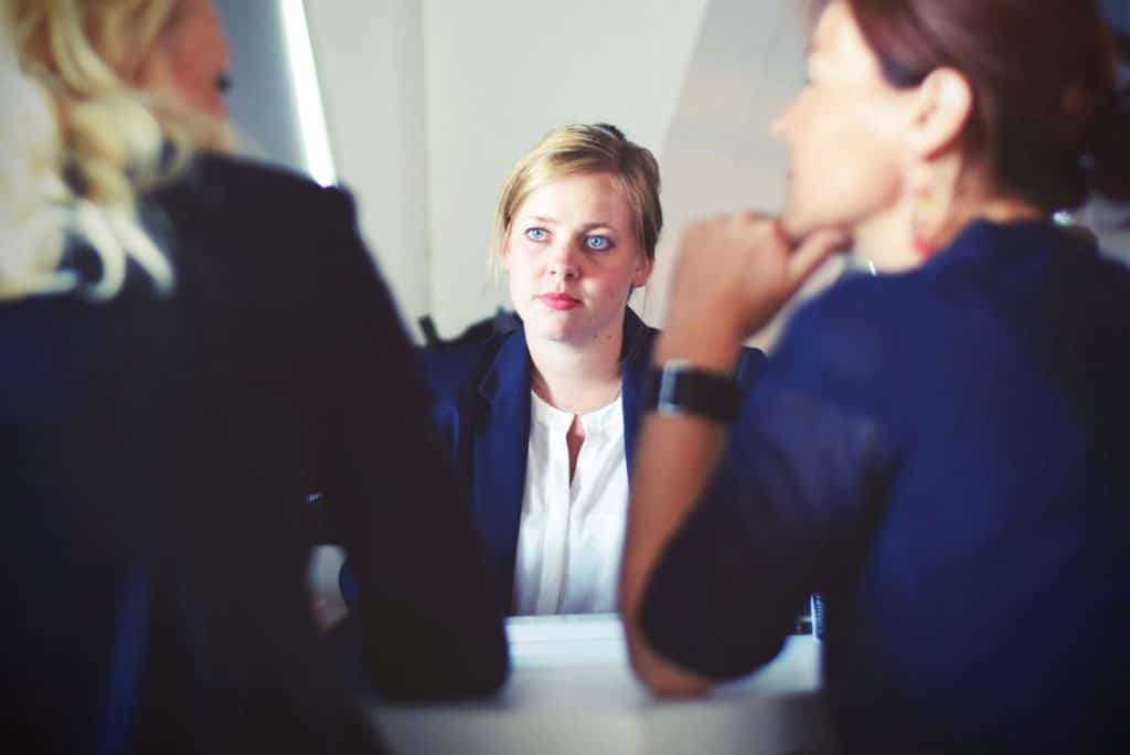 Photo of three business woman in a meeting